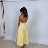 ODD MUSE (yellow) halter drop hem midi