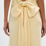 MISHA (yellow/butter) The Honor satin v-neck bow maxi